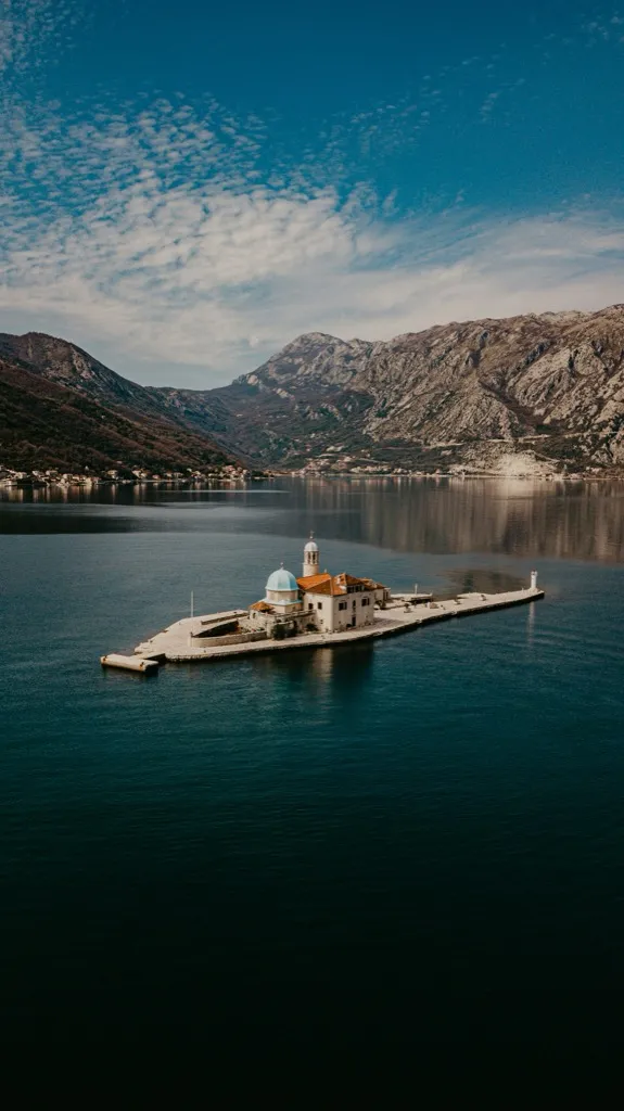 Boat on water near mountains, Montenegro